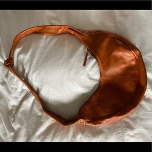 Anthropologie brown leather bag, with tie straps